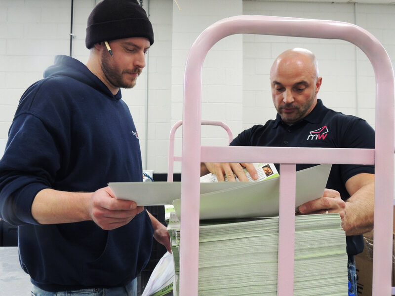 Mail moving through the finishing equipment on the production floor