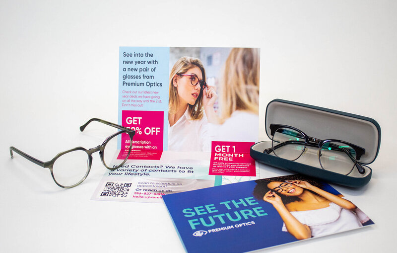 A Premium Optics direct mail campaign: a postcard, insert and eyeglasses case